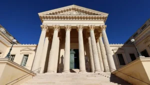 a large building with columns and a door