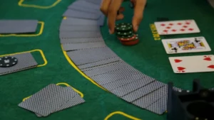 a person playing a game of cards on a table